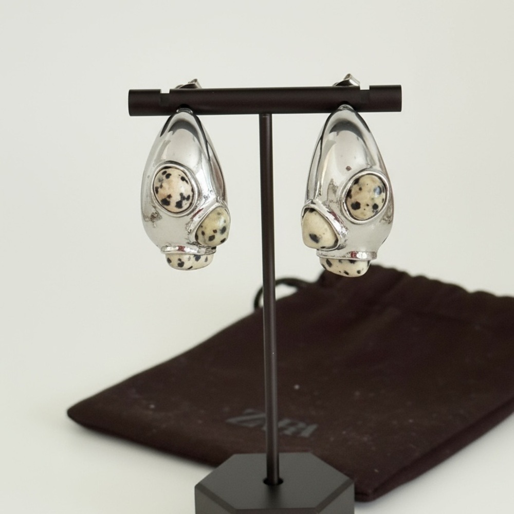 Zara EUC crescent shaped silver toned earrings with stones